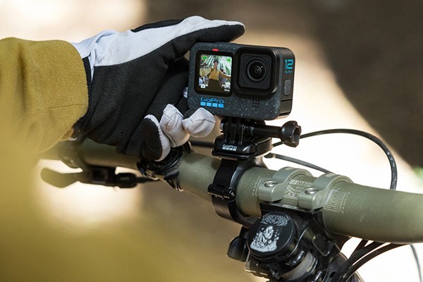 gopro attached to MTB bars facing rider taking selfie